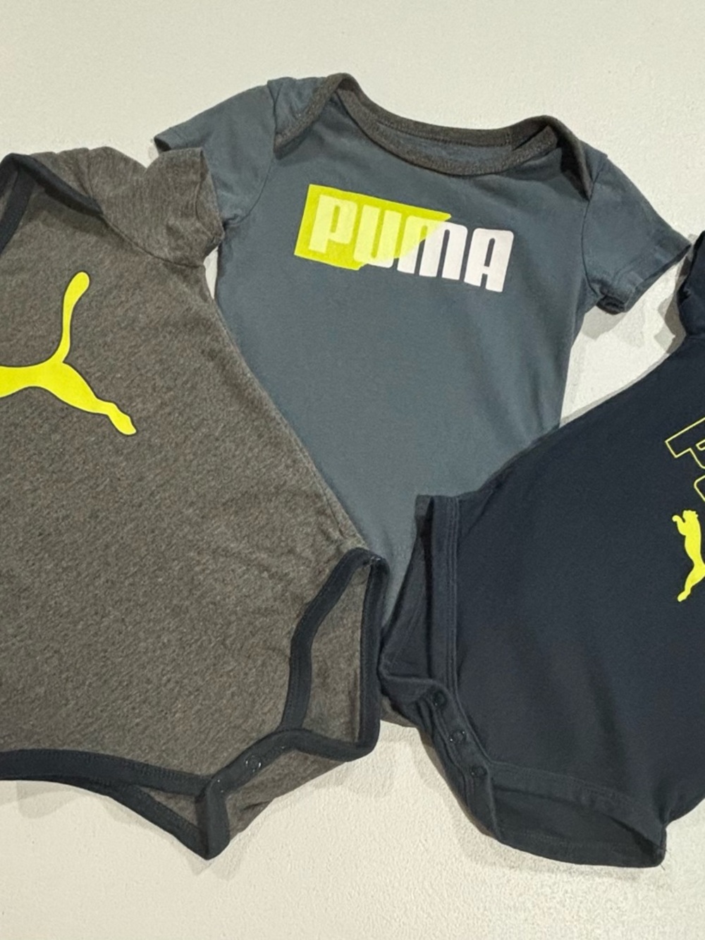 Puma Kids Gray, Navy & Charcoal One-Piece Bodysuit 3-Pack with Yellow Logo